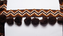 Ibiza pompom band donker bruin 45 mm (ca. 5 meter) Ibiza pompom band donker bruin 45 mm (ca. 5 meter)